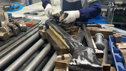 Carbon fiber layup inside a bicycle frame mold Carbon fiber layup inside a bicycle frame mold